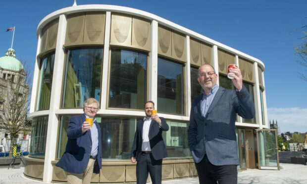 Council co-leader Ian Yuill and finance convener Alex McLellan standing at Rosemount Pavilion space at Union Terrace Gardens with John Wigglesworth. Supplied by Aberdeen City Council.