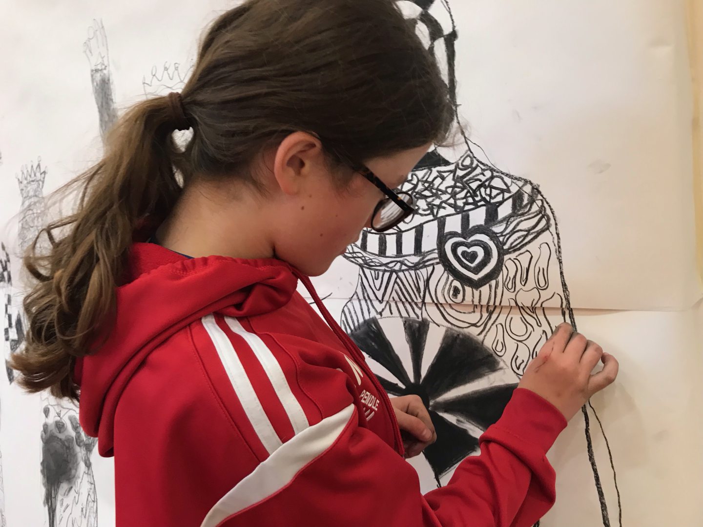 Highland pupil Abi fills in an intricate pattern at Big Draw 2022