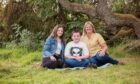 Alice Robertson and her two grandchildren Lee, 13, and Shannan, 15. Photo by Susan Renee at Kingshill Studios.