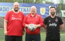 Ryan McKenzie, coach Alisdair Cook and other Man V Fat Player photographed together with Alisdair in the middle holding a football