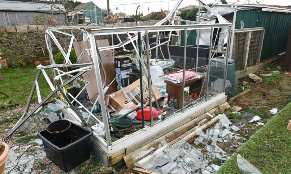 A destroyed greenhouse as a result of Storm Arwen