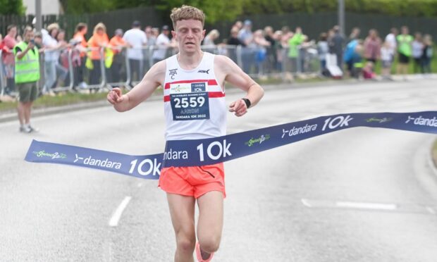 Aaron Odentz winning the 10k, his second race of the day. Pictures by Chris Sumner