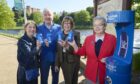 To go with story by Chris Cromar. Residents and visitors to Inverness are being encouraged to use a new Scottish Water Top Up Tap on the banks of the River Ness to stay hydrated while on the go. Picture shows; Councillors Isabelle MacKenzie, Alex Graham, Bet McAllister, Trish Robertson. Inverness. Supplied by Scottish Water Date; Unknown