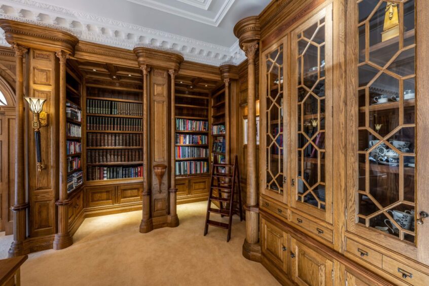 Dalhebity House's dark wood library