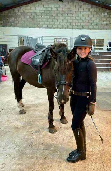 Olivia with her pony Star. She wants to be a riding instructor