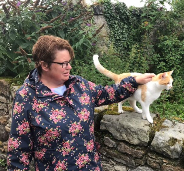 Jill loved cats and always found one on one of her walks.
