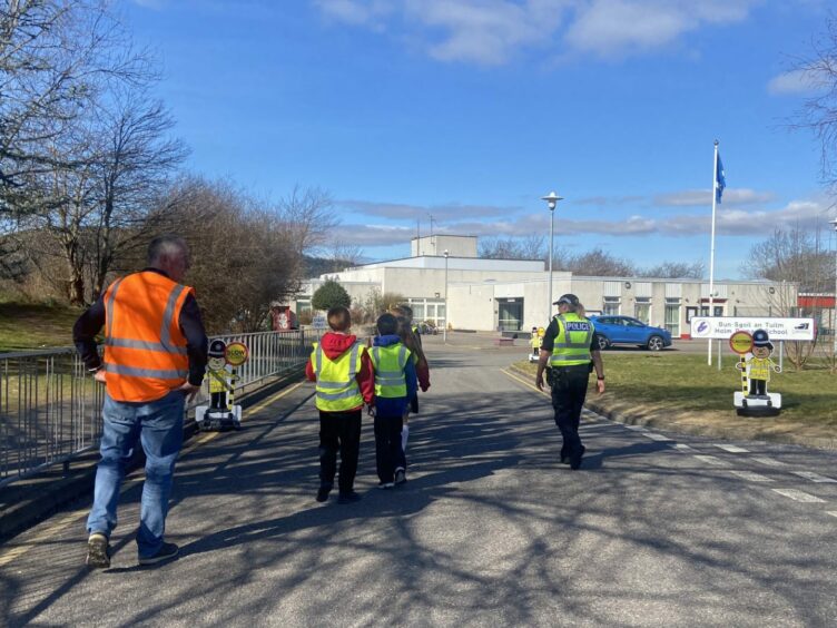 Holm primary school pupils walking to school.