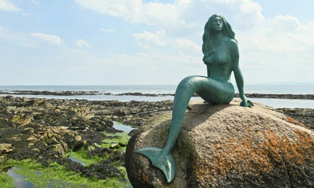 A merman is proposed to join a mermaid in a Highland village.