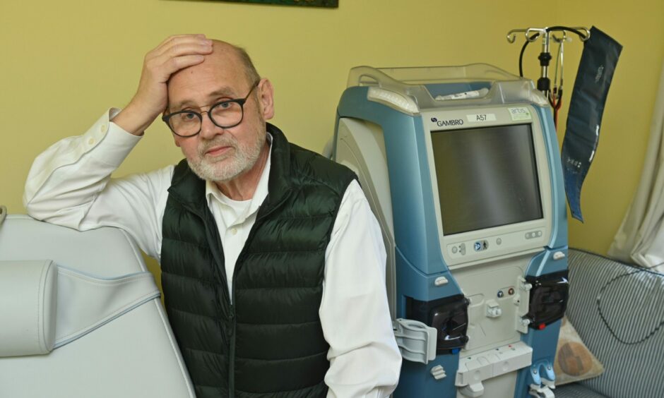 George Cook and his home kidney dialysis equipment. 