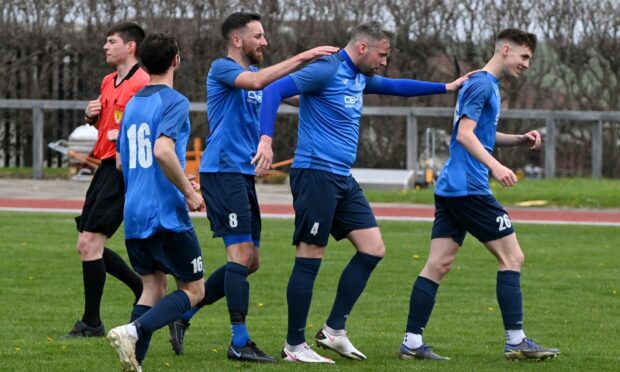 Bridge of Don Thistle's Craig McKeown (no4) celebrating with team mates after scoring a free kick to make it 2-0 against Dyce.

Picture by Kenny Elrick     30/04/2022