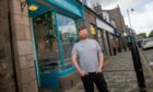 Colin Redman stands outside his Birdhouse Cafe in Banchory.