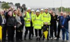 Contractors celebrated opening of new Haudagain bypass.