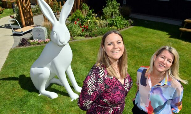 Clan chief executive Fiona Fernie and Sarah Hardy from Wild in Art with one of the hares.  Photo by Kami Thomson