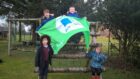 Pupils from Kinlochewe Primary School celebrate their 8th Green Flag. Picture: Kinlochewe Primary School