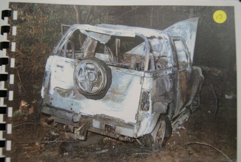 The wreckage of the car involved in the murder of Claire Morris