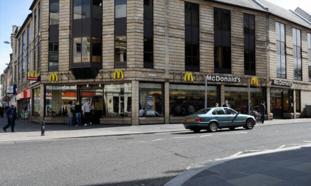 The woman swore a McDonald's manager then assaulted a police officer.
