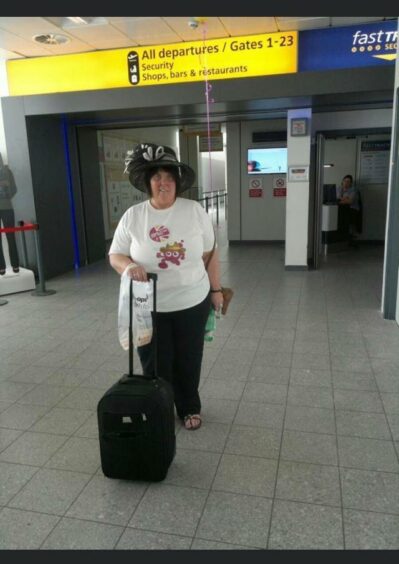 Margaret McMartin in the airport heading to Brussels. 