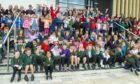 Aberdeen City Council co-leader Ian Yuill and head teacher Lynsey Cradock are surrounded by pupils as they open the new Milltimber School.