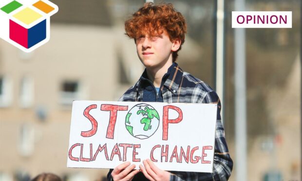 A school student and activist takes part in the Global Strike for Climate rally in Edinburgh (Photo: Ewan Bootman/Shutterstock)