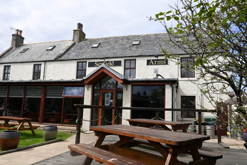The outside of the Seafield Arms has a garden area with picnic tables.
