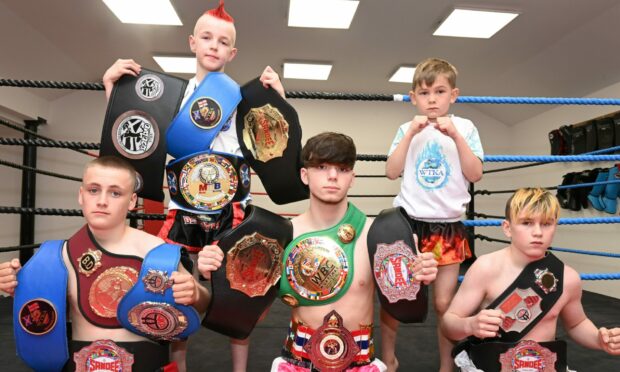 Five Aberdeen fighters have been selected to represent Great Britain at the World Muay Thai boxing Championships. From from the back row L-R: Jaxon Ritchie, Cooper Rataj, Jack Robertson, Rudy Da Silva and Zac Sim.