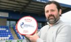 Cove Rangers boss Paul Hartley with the League One manager of the month award