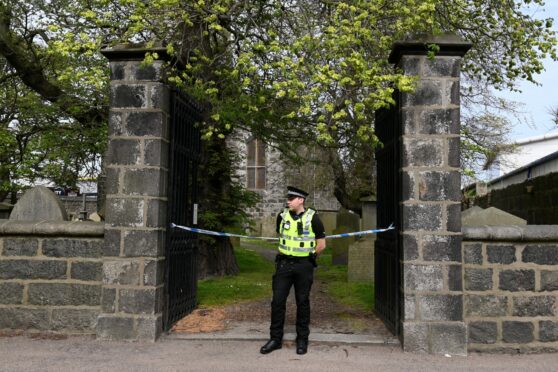 Police at the scene of the alleged attack at East St Clement's Church. Image: DC Thomson