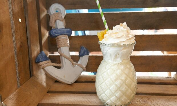 Who needs Taylor Swift when you can 'shake it off' at Cafe Ahoy. Pictured is the mouthwatering pina colada hard shake with white rum, coconut rum and pineapple, coconut and vanilla ice cream. Picture by Paul Glendell