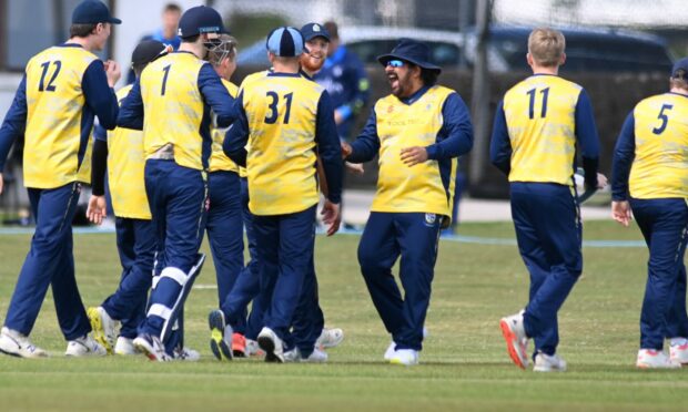Stoneywood-Dyce celebrate taking a wicket  against Grange. Picture by Paul Glendell