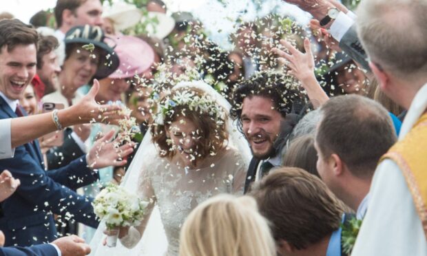 Rose Leslie and fellow Game of Thrones star Kit Harington on their wedding day. Picture by Jason Hedges.