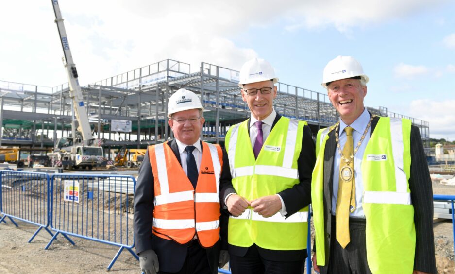 Bill Howatson with Deputy First Minister John Swinney and Derek Shewan of construction firm Robertson at the Inverurie Campus site back in August 2018. Picture by Kami Thomson