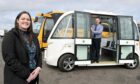Stagecoach Highland boss David Beaton steps aboard his first driverless bus, with HITRANS project and policy manager Jane Golding. Picture by Sandy McCook.