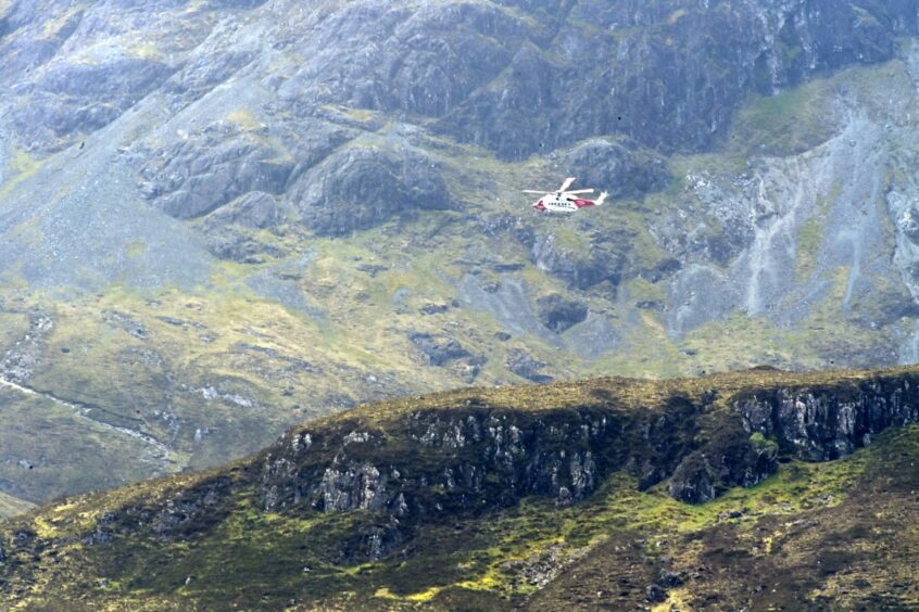 Mountain Rescue teams are in attendance alongside the coastguard rescue helicopter and police
