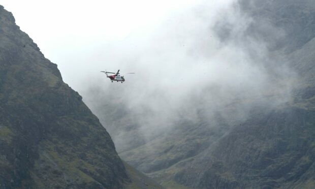 The Stornoway coastguard helicopter has been seen flying in the Blaven area as efforts to rescue an unwell walker continue.