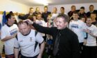 Former Caley Thistle manager John Robertson, right, and assistant Donald Park celebrate the First Division title win in May 2004.  Picture by Sandy McCook