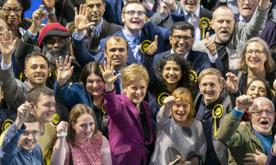 First Minister Nicola Sturgeon with SNP candidates and supporters at the Glasgow City Council count at the Emirates Arena in Glasgow.