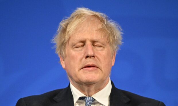 Prime Minister Boris Johnson speaks during a press conference in Downing Street.
