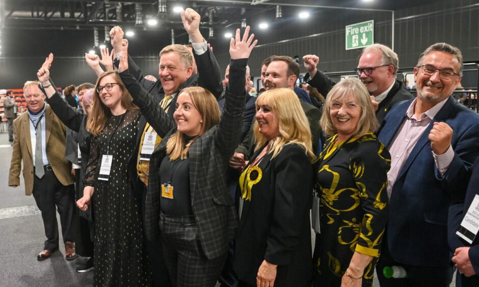 The Aberdeen SNP celebrate after gaining a 20th seat as the results of Thursday's election are shared at P&J Live. Picture by Scott Baxter/DCT Media.