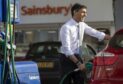 Rishi Sunak at a Sainsbury's posing for photos for press post-budget 2021 (not his car...)  Picture by HM Treasury