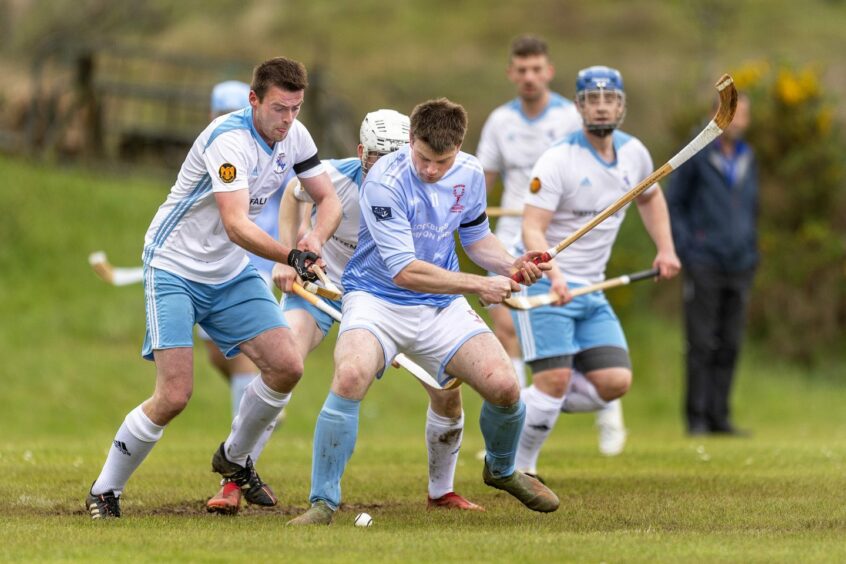 Shinty players in action at Pairc nan Laoch