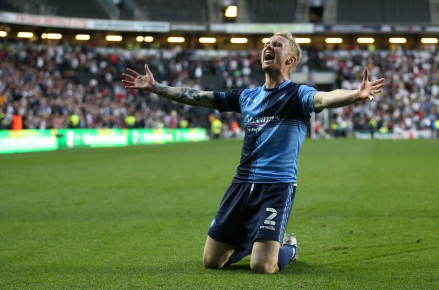 Wycombe Wanderers' Jack Grimmer celebrates reaching the final after the Sky Bet League One play-off semi-final against MK Dons