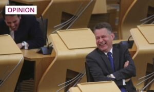 Scottish Conservative MSP Murdo Fraser (foreground) laughs during Topical Questions at the Scottish Parliament (Photo: Fraser Bremner/Scottish Daily Mail/PA)