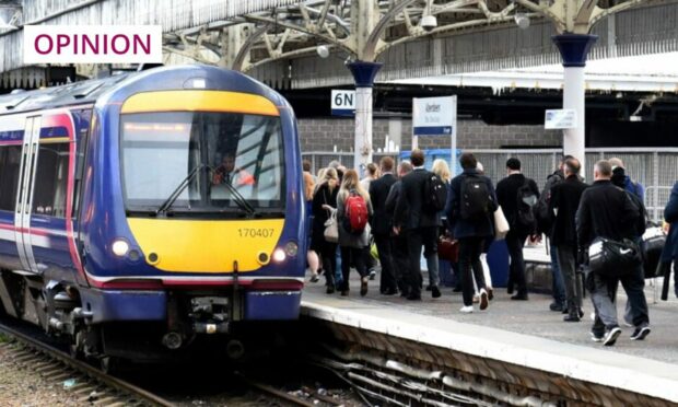 Commuters board a train at Aberdeen railway station (Photo: Kenny Elrick/DC Thomson)