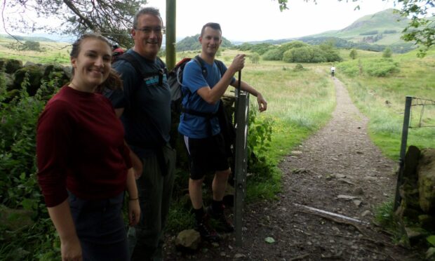 Richard Huxtable (centre) with son Robert (right) and daughter Ellie (left) on the West Highland Way.
