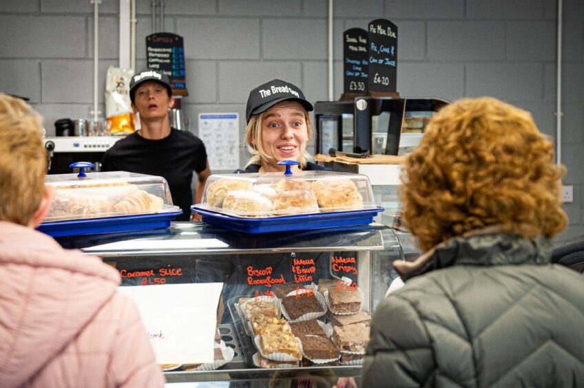 Employees serve locals in The Bread Guy bakery in Inverurie.