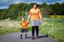 Claire Penny is leading a group of mums taking part in the upcoming Aberdeen Kiltwalk for Charlie House. Here she is with son Caleb. 
Picture by Wullie Marr