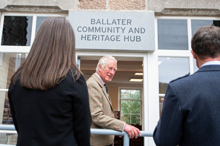 Prince Charles outside Ballater Community and Heritage hub. World Photography Day