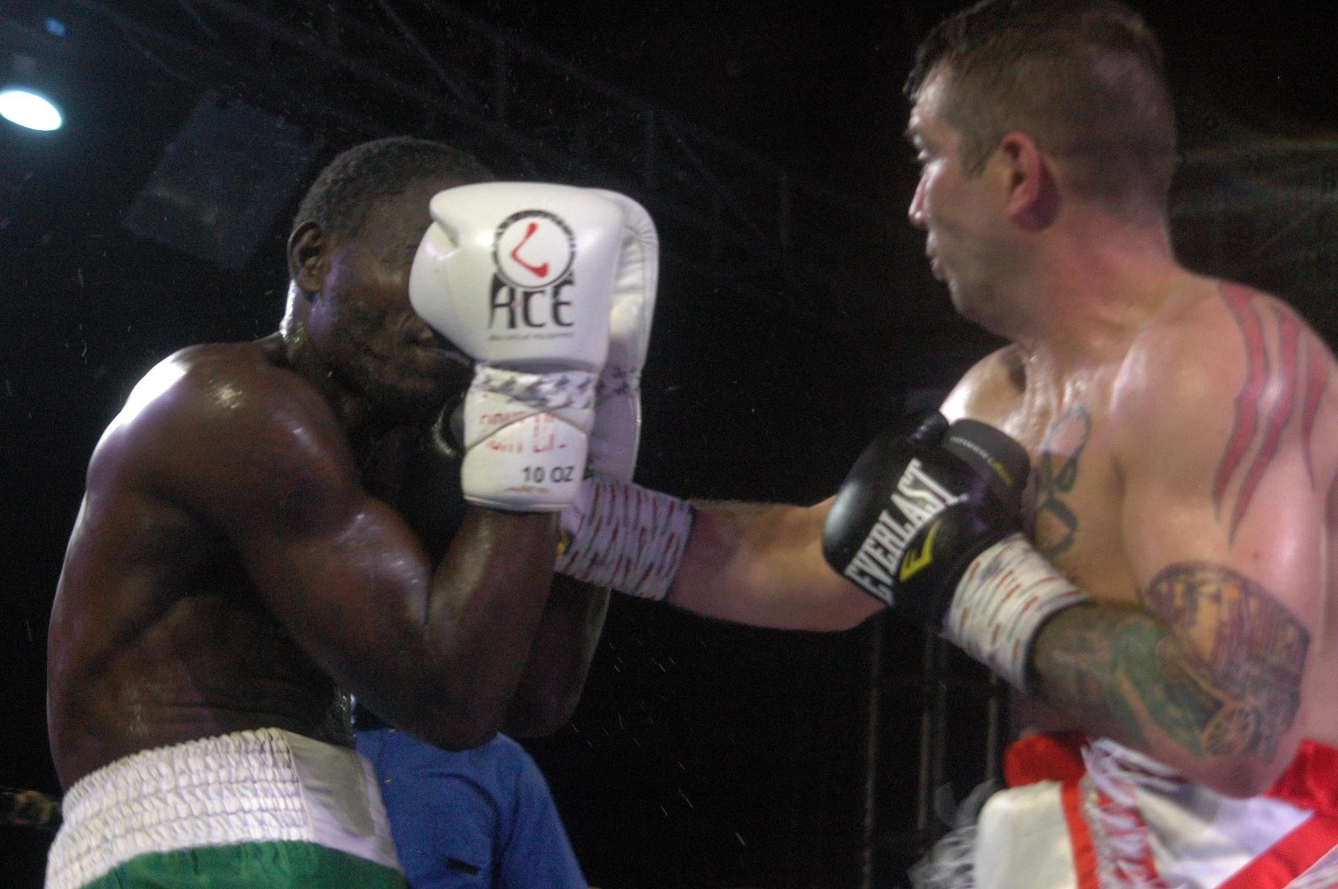 Boxer Lee McAllister landing a punch on opponent.