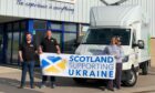 Greig O'Donnell, representing Herd Hire and Jim Reid who provided the van and insurance, with John Fairclough and Amanda Richardson from Scotland Supporting Ukraine.