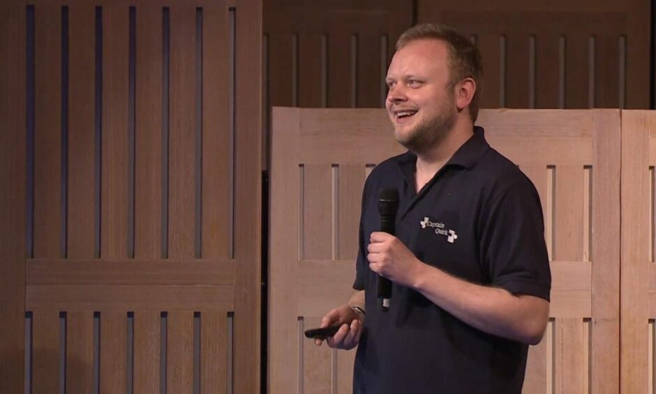 Chris Bonnello delivering a speech at Sydney Opera House. He will speak at XpoNorth calling for an end to harmful stereotypes of autism.